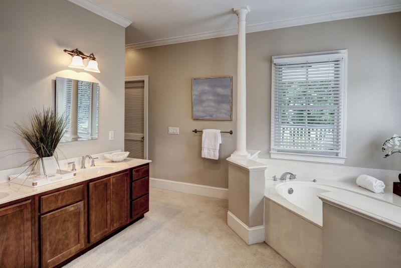 Upscale bathroom with custom cabinetry